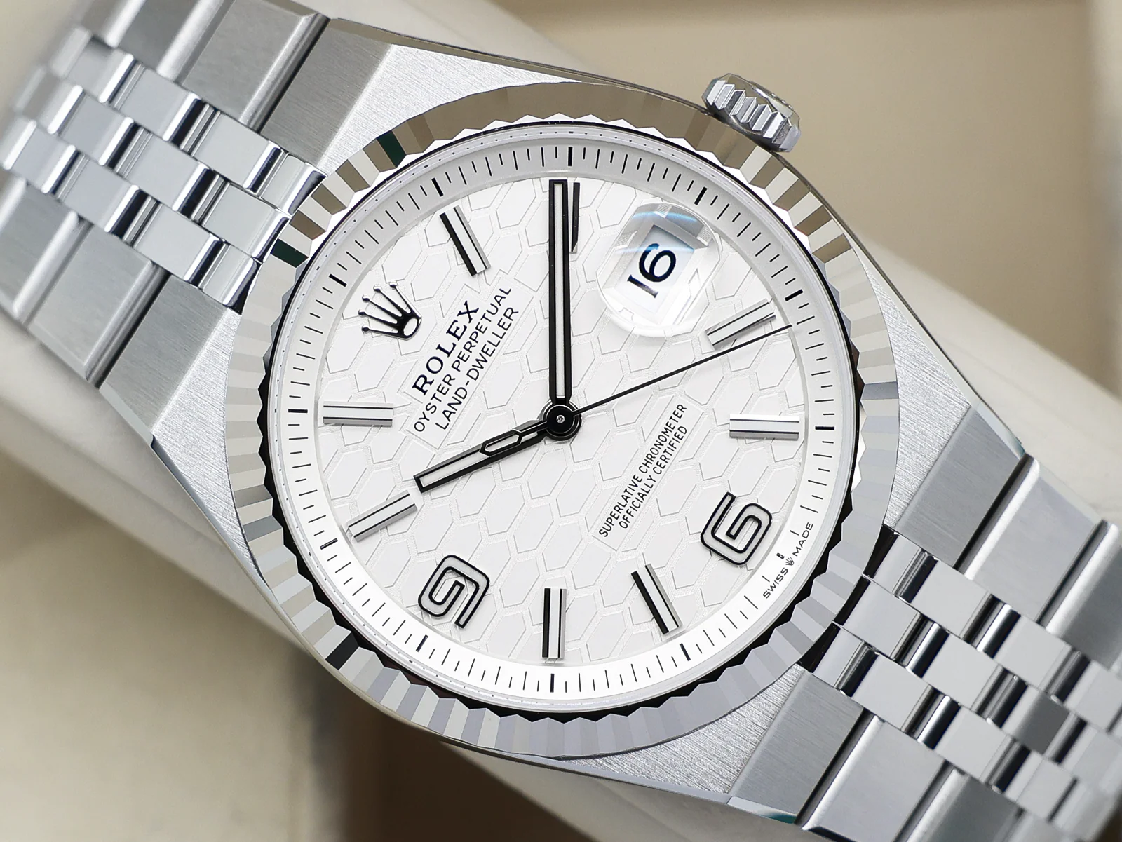 Rolex Land-Dweller 127334 40mm Stainless Steel White Honeycomb Dial – Unworn 2026 Full Set 9 Rolex Land-Dweller 127334 white honeycomb dial front view
