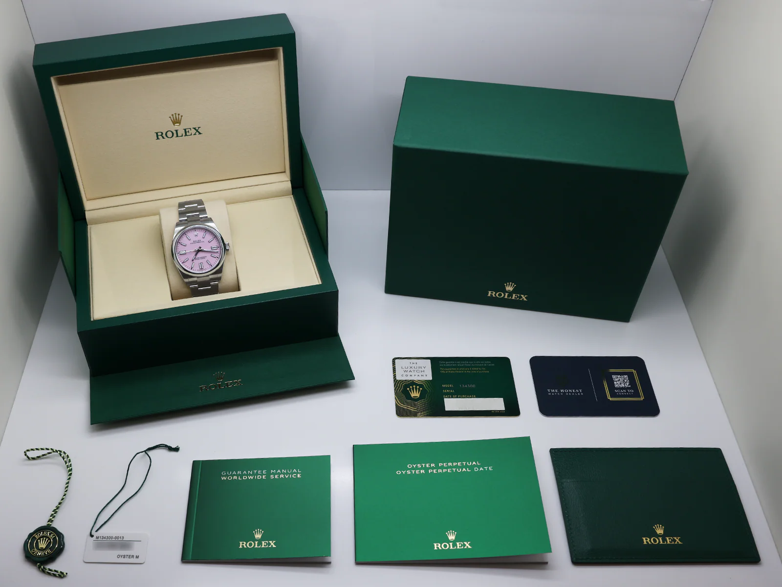 Rolex Oyster Perpetual 41 Candy Pink Dial 134300 Stainless Steel – Unworn 2026 Box & Papers 9 Rolex Oyster Perpetual 41 candy pink angled view
